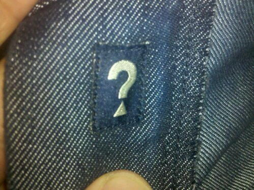 question mark embroidered inside a pair of my Guess Jeans